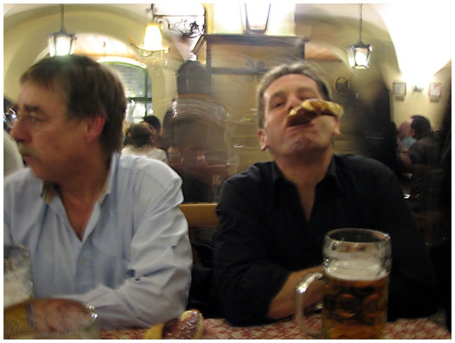IMG_8780 Hofbrauhaus - A new German friend shows us how to eat pretzels